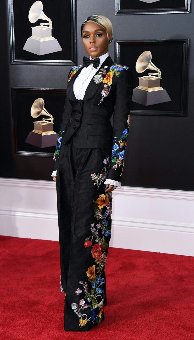 Janelle Monae looks impeccable in a beautifully embroidered Dolce & Gabbana suit. Monae knows how to wear a suit well, and this may just be one of her best looks ever.  Angela Weiss / AFP.