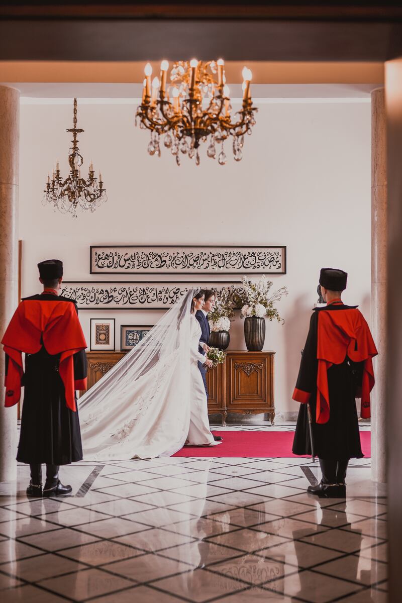 Prince Hashem and Princess Rajwa enter Zahran Palace for the wedding ceremony. EPA