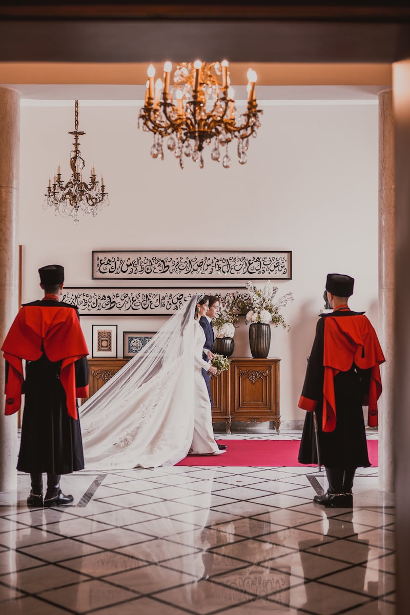 Prince Hashem and Princess Rajwa enter Zahran Palace for the wedding ceremony. EPA