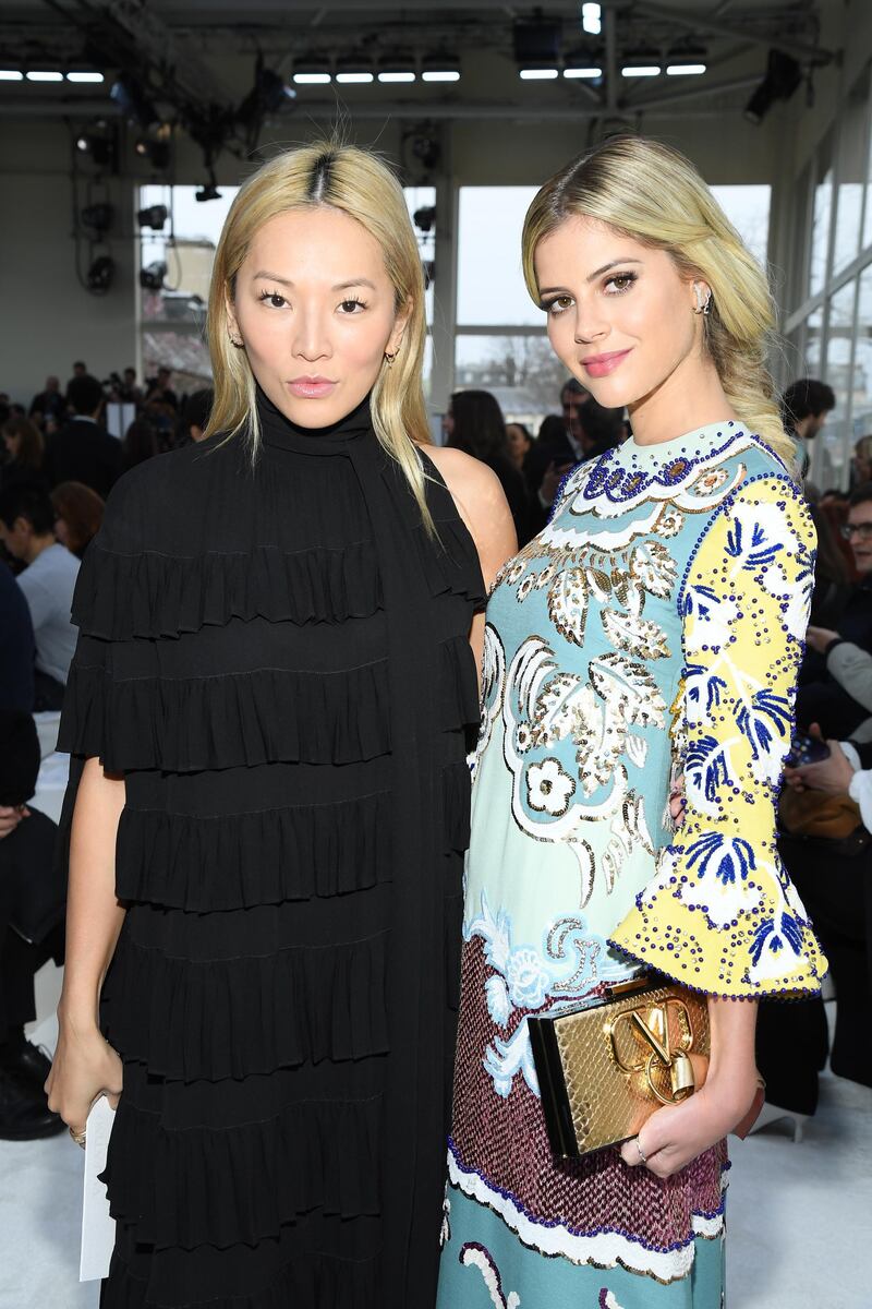 Tina Leung and Lala Rudge attend the Valentino show in Paris (Photo by Pascal Le Segretain/Getty Images)
