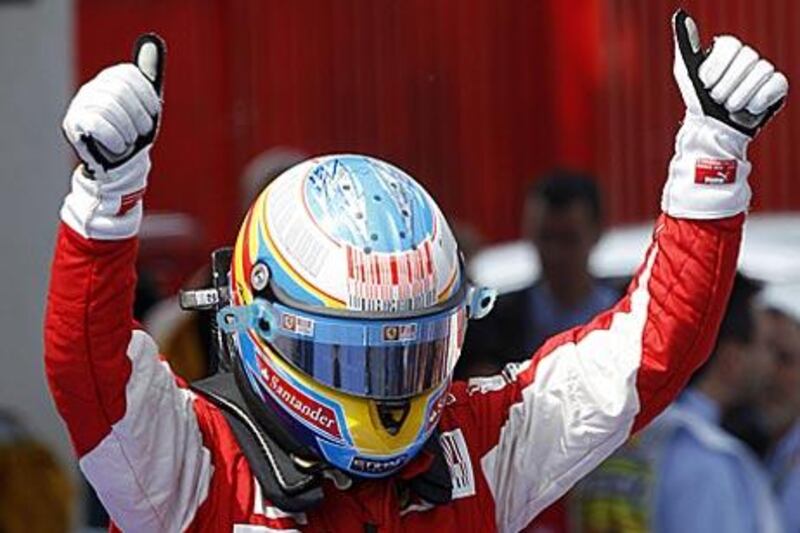 Fernando Alonso celebrates after finishing second in the Spanish Grand Prix.