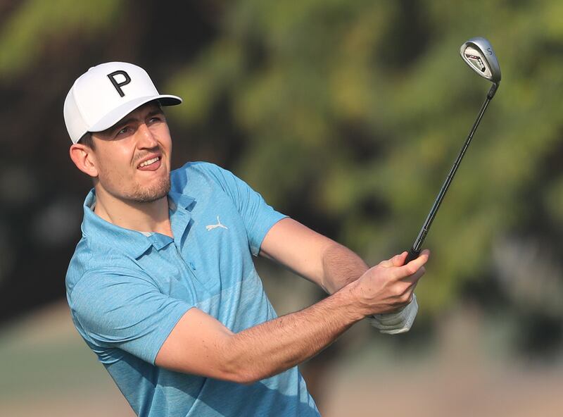 Manchester United and England defender Harry Maguire plays a shot during the pro-am.