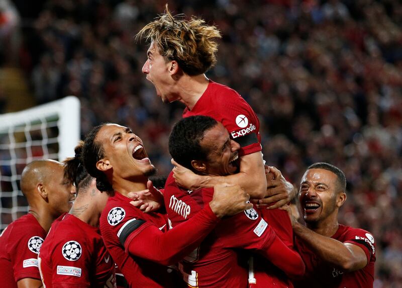 Joel Matip celebrates scoring their second goal with teammates. Action Images