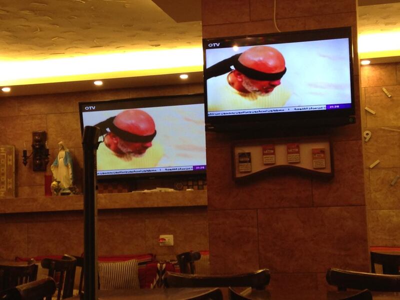 An episode of the Lebanese prank show Hadde Albak featuring the kidnapping of actor Wajih Sakr is seen on televisions in a Beirut cafe in June 2016. Josh Wood for The National