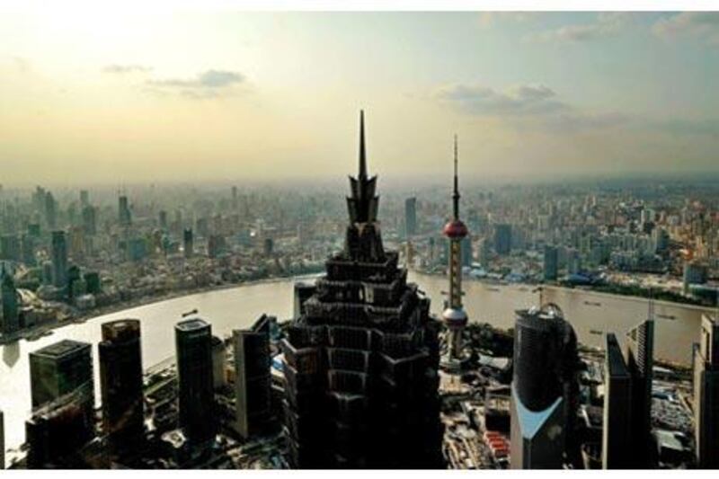 On the once-desolate mudflats of Pudong, the new towers of Shanghai shimmer and wink, mocking the outdated grandiloquence of the colonial European buildings on the Bund.