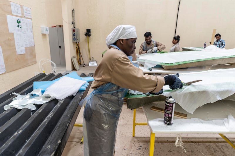 About 60 people are being trained in Ras Al Khaimah by Sunreef to build high-end yachts, with the staff set to increase to 300 in a few months and to 1,000 next year. Antonie Robertson / The National 

