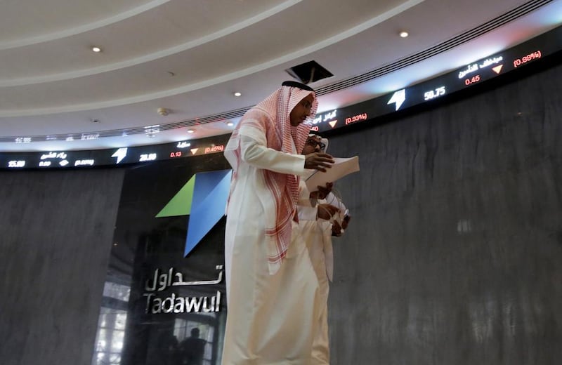 Saudi Arabia's stock exchange, the Tadawul, was upgraded to emerging market status by MSCI in June. AP Photo