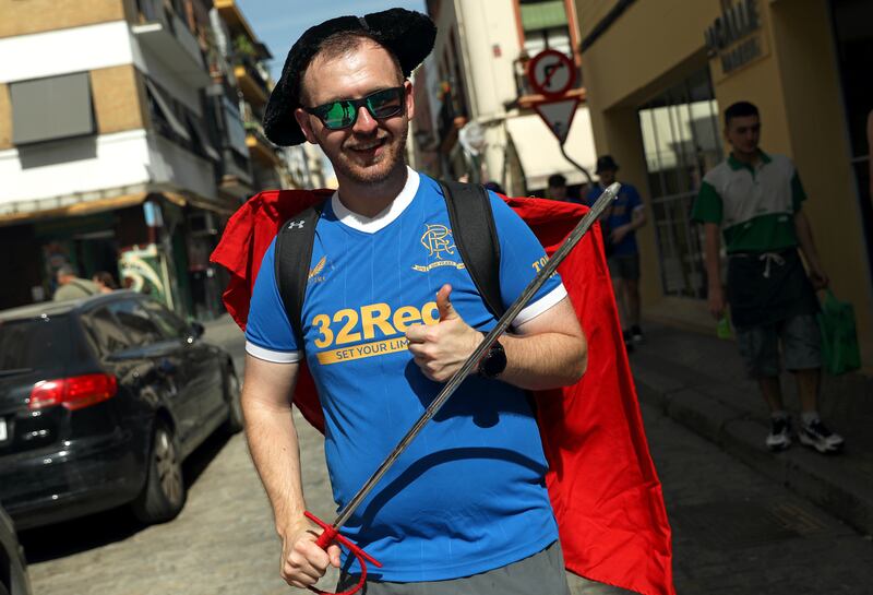 A Rangers fan dressed as a matador. PA