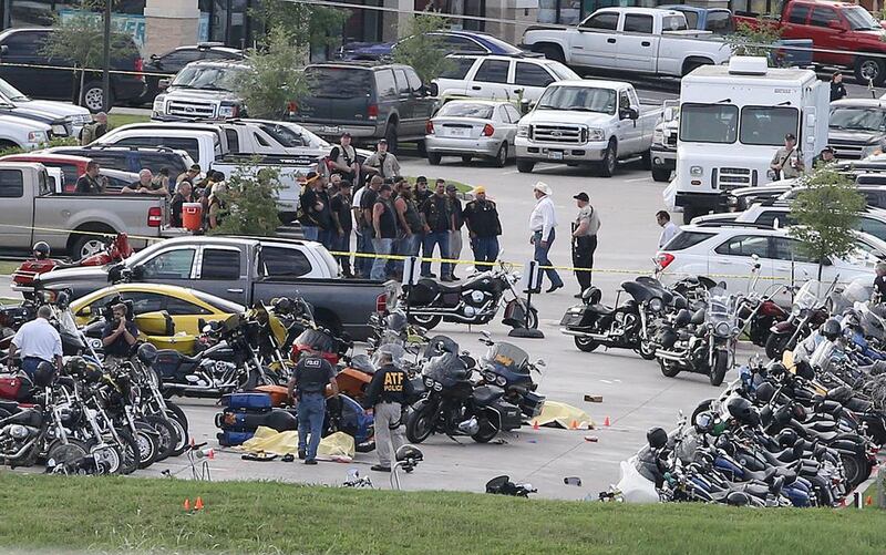 When the shooting ended, bodies were scattered across two car parks. Jerry Larson/AP Photo