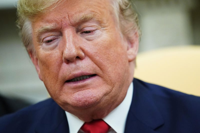 (FILES) In this file photo taken on November 13, 2019 US President Donald Trump speaks during a meeting with  Turkey's President Recep Tayyip Erdogan and a group of Republican senators in the Oval Office of the White House in Washington, DC. Congress can request nearly a decade of Donald Trump's tax filings, an appeals court said on November 13, 2019, striking a new blow to the US president as he attempts to keep his financial records out of Democrats' hands. The decision marked the second time an appeals court has denied Trump's attempt to avoid a House subpoena that calls for him to turn over eight years of accounting documents.
 / AFP / MANDEL NGAN
