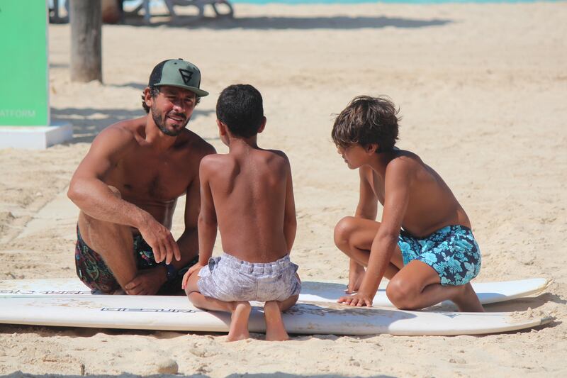 Surf Camp Egypt founder Omar El Sobky teaching the younger generation. Photo: Tulip Afifi