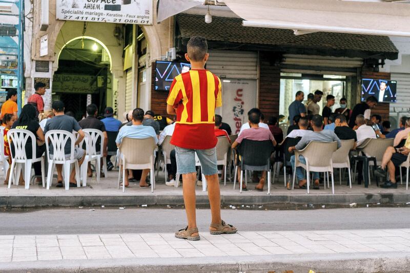 By the time the match is set to begin, so many people in Bab Souika are wearing the team's yellow and red stripes that the neighborhood looks like a Where's Wally spread. Erin Clare Brown/ The National