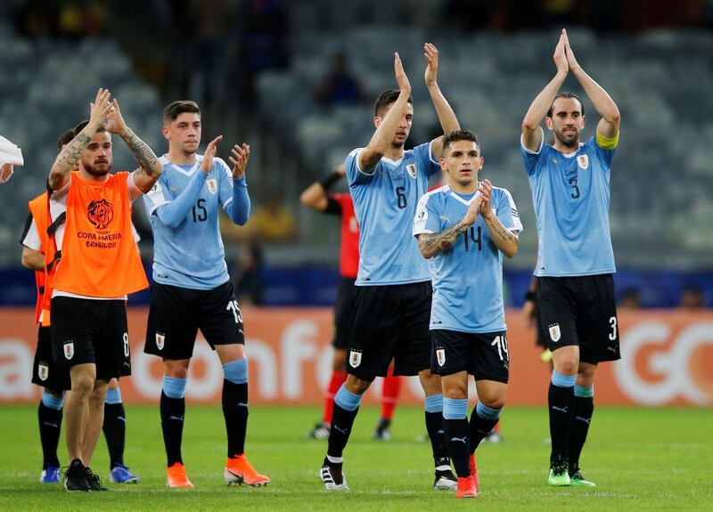 Soccer Football - Copa America Brazil 2019 - Group C - Uruguay v Ecuador - Mineirao Stadium, Belo Horizonte, Brazil Uruguay's Lucas Torreira, Diego Godin and team mates applaud fans after the match.  Reuters