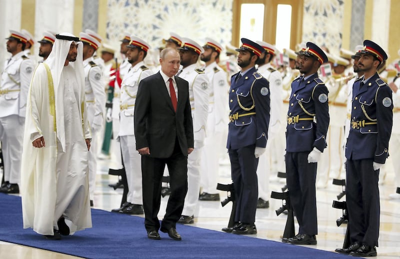 ABU DHABI , UNITED ARAB EMIRATES , October 15  – 2019 :- Sheikh Mohammed bin Zayed Al Nahyan, Crown Prince of Abu Dhabi and Vladimir Putin, President of Russia during the guard of honour by the members of the UAE Armed during his visit at the Presidential Palace in Abu Dhabi.  ( Pawan Singh / The National )  For News. Story by John