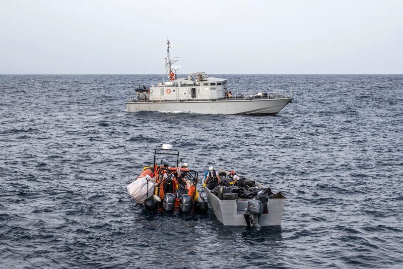 Boat crew taking part in a search and rescue operation to aid migrants in the Mediterranean. AFP