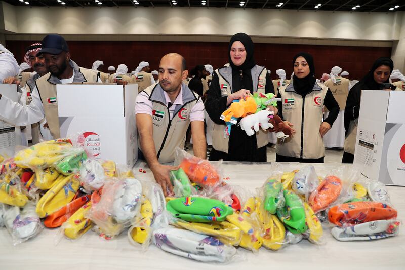 The target by the end of the day is to fill about 15,000 aid boxes. Pawan Singh / The National