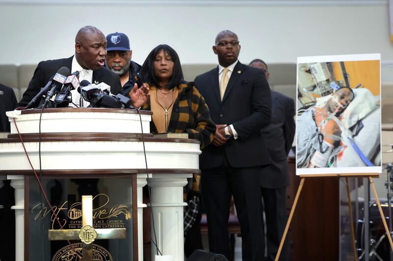 Civil rights lawyer Ben Crump speaks, flanked by the parents of Tyre Nichols and faith and community leaders. AFP