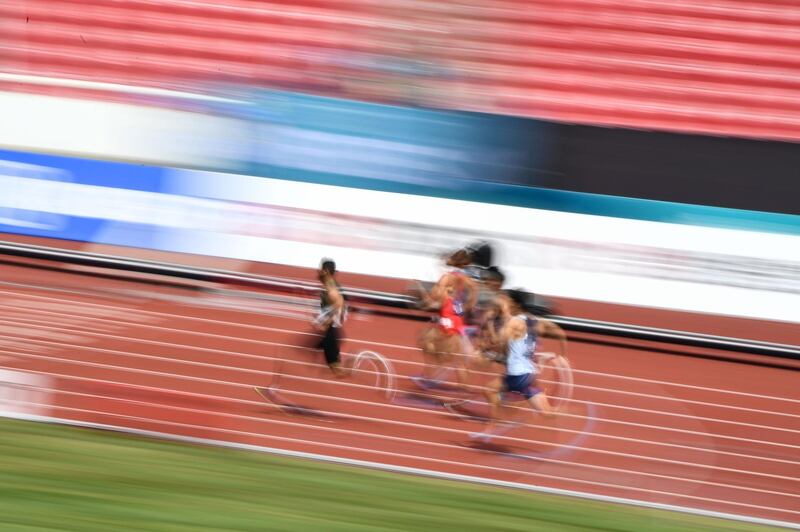 Saudi Arabia's Mohammed al Qaree (L) leads in the men's 100m decathlon athletics event during the 2018 Asian Games in Jakarta. AFP