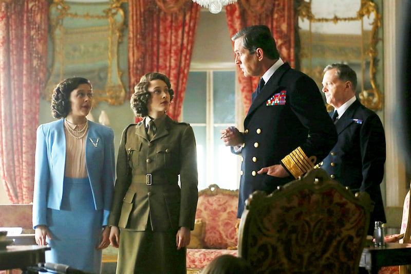Bel Powley as Princess Margaret, left, and Sarah Gadon as Princess Elizabeth with and Rupert Everett as King George in a Royal Night Out. On V.E. Day in 1945, as peace extends across Europe, Princesses Elizabeth and Margaret are allowed out to join the celebrations.
CREDIT: Courtesy Nick Wall / Lionsgate *** Local Caption ***  al23jl-A Royal Night Out-p5.jpg
