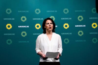 Annalena Baerbock, co-leader of Germany's Green Party and top candidate in the upcoming national election in September, gives a statement in reaction to Regional polls in Saxony-Anhalt state elections, in Berlin, Germany, on June 6, 2021. Chancellor Merkel's conservatives scored a convincing win at state elections in Saxony-Anhalt on June 6, seeing off a threat from the far-right AfD in the final regional poll before the first election in 16 years not to feature the veteran chancellor. / AFP / POOL / Markus Schreiber
