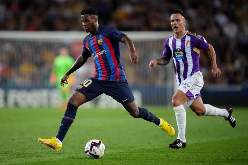 Barcelona forward Ansu Fati runs with the ball during the match against Real Valladolid. Getty