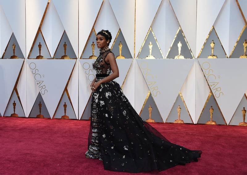 Janelle Monae, wearing a textured Elie Saab dress, arrives at the 89th Oscars on February 26, 2017. AFP