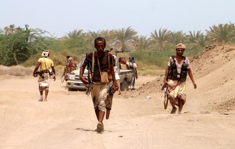 epa07666630 Yemeni government forces backed by the Saudi-led coalition advance during fighting against Houthi rebels on the outskirt of the port city of Hodeidah, Yemen, 22 June 2019. According to reports, the Yemeni government troops have advanced to the southeastern outskirts of the Houthi-controlled city of Hodeidah, which is the key lifeline entry point for the Arab countryâ€™s most food imports and humanitarian aid. The Saudi Arabia has been leading a military coalition to support the exiled Yemeni government against the Houthis since in Yemen March 2015.  EPA/NAJEEB ALMAHBOOBI