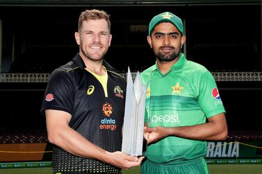 Aaron Finch of Australia and Babar Azam pose with the Australia-Pakistan T20 series trophy at the Sydney Cricket Ground. Getty Images