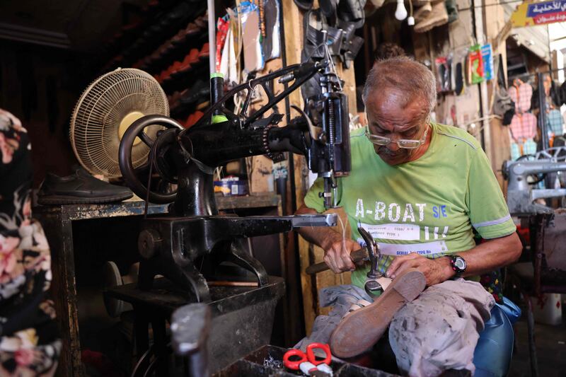 Bizri said their work 'has increased 60 per cent' since the crisis began, adding that people now prefer to spend up to one million Lebanese pounds (around $11 on parallel markets) to fix old shoes rather than buy new ones