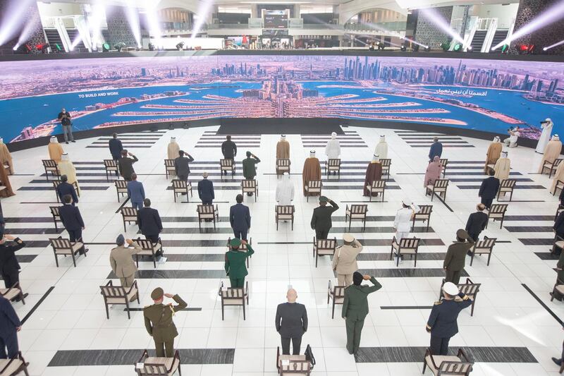 ABU DHABI, UNITED ARAB EMIRATES - February 21, 2021: Dignitaries stand during the UAE national anthem, during the opening ceremony of the 2021 International Defence Exhibition and Conference (IDEX), at Abu Dhabi National Exhibition Centre (ADNEC).

( Saleh Al Saeari / Ministry of Presidential Affairs )​
---