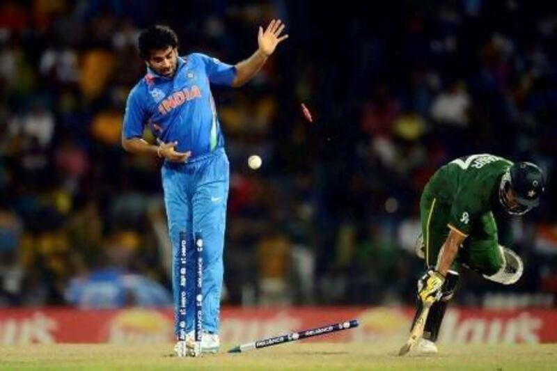 Pakistan's Yasir Arafat is run out as India's Zaheer Khan watches the bails come off. There was plenty of drama in Colombo tonight. Philip Brown / Reuters