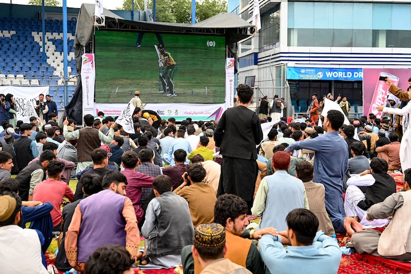 Large screens were strategically placed so fans could cheer on their side. AFP