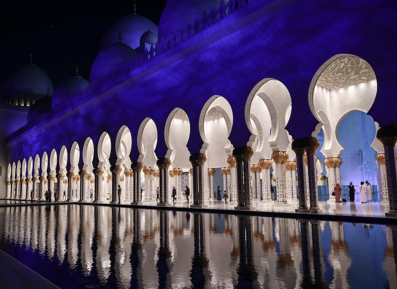 The illuminated Sheikh Zayed Grand Mosque. Victor Besa / The National