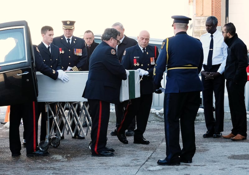Halifax Regional Police and Fire Honour Guard transport the casket of one of the Barho family children during a funeral service for the Syrian refugee family who lost seven children in a fire. Reuters