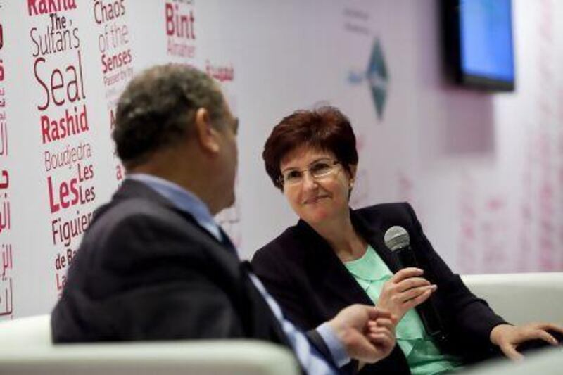 Author Dr Elizabeth Kassab, right, recipient of the Sheikh Zayed Book Award, speaks during a question-and-answer session during the Abu Dhabi International Book Fair.