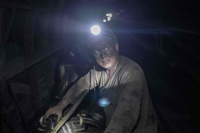 A worker in the mine called Heroes of the Cosmos in Pavlograd city, east Ukraine. AFP