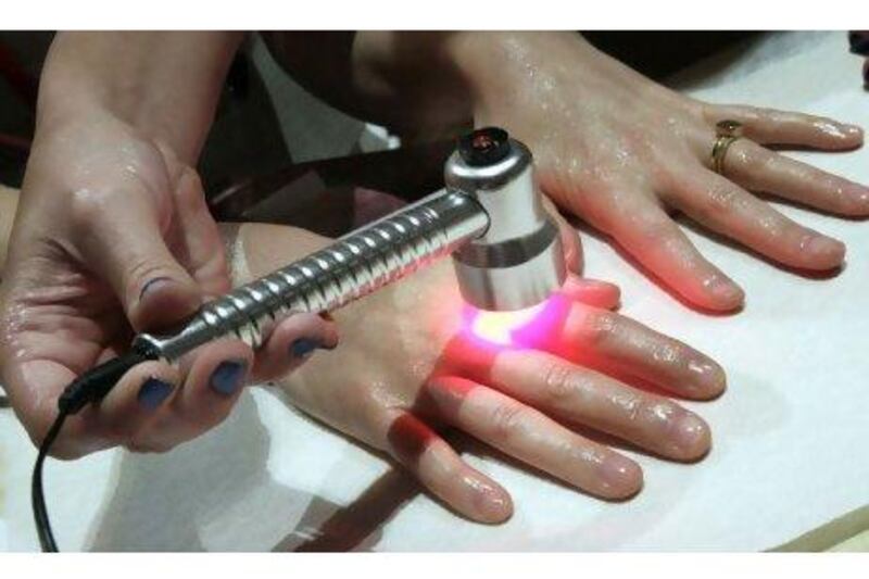 A Baby Quasar device used for the Embrace Light Hand Treatment.