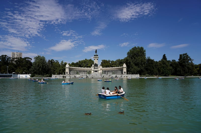 4. Travellers on the lake at El Retiro Park in Madrid, Spain. Reuters