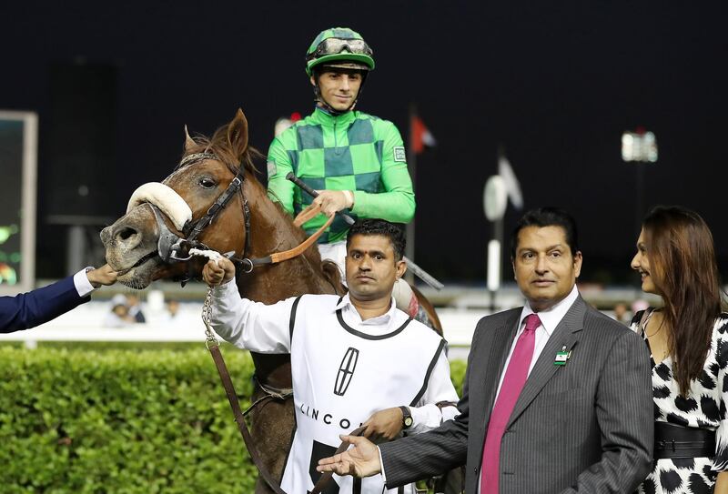 DUBAI , UNITED ARAB EMIRATES , Jan 18  – 2020 :- Antonio Fresu   (no 5 ) guides Emblem Storm (USA)  to win the 2nd horse race 1600m dirt at the Meydan Racecourse in Dubai. Trainer Satish Seemar also seen on the right. ( Pawan Singh / The National ) For Sports. Story by Amith