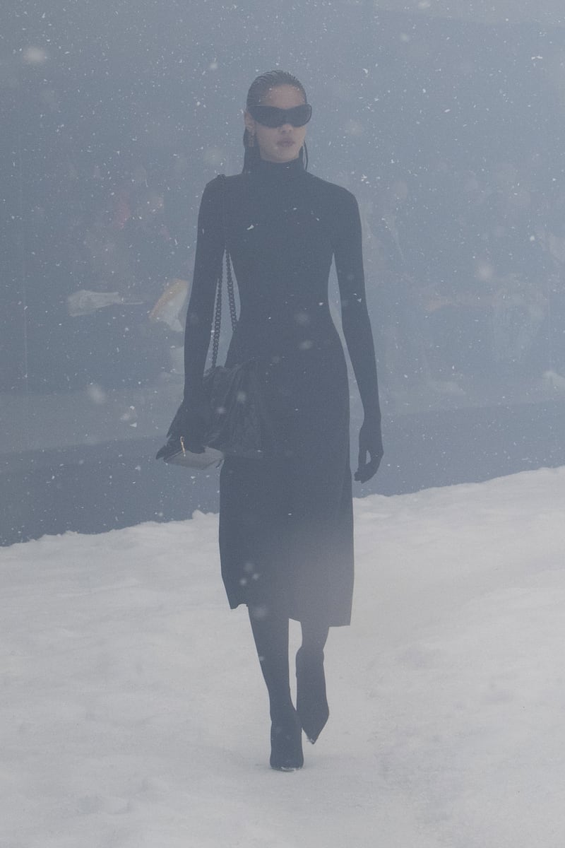A model wore sunglasses in the fake snowstorm.