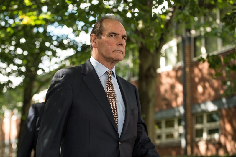 Former chief constable Norman Bettison leaves his first court appearance in connection with the 1989 Hillsborough football stadium disaster, at Warrington Magistrate's Court, in Warrington, north west England on August 9, 2017.
Five men charged over the 1989 Hillsborough football stadium disaster, in which 96 Liverpool fans died, were to appear in court for the first time on August 9, 2017. / AFP PHOTO / OLI SCARFF
