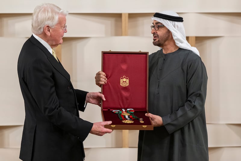 Olafur Grimmson, former president of Iceland, receives his accolade from Sheikh Mohamed. Abdulla Al Neyadi / Presidential Court