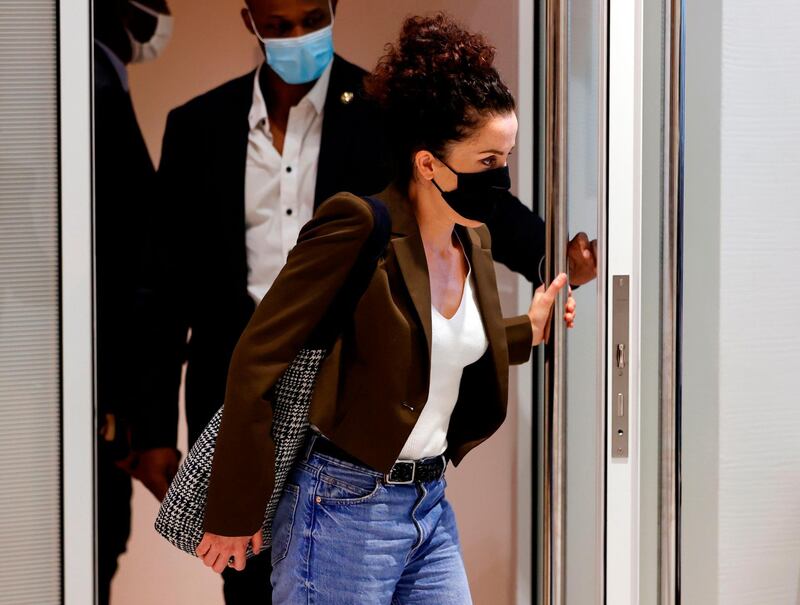 Cartoonist Corinne Rey, also known as 'Coco', who appeared as a witness, leaves the courtroom at the Paris courthouse, on September 8, 2020, after a hearing of several witnesses in the trial of 14 suspected accomplices in the Charlie Hebdo, Montrouge and Hyper Cacher jihadist killings.
 Fourteen people accused of helping jihadist gunmen attack the French satirical weekly Charlie Hebdo and a Jewish supermarket are on trial, five years after days of terror that sent shockwaves through France. / AFP / Thomas SAMSON

