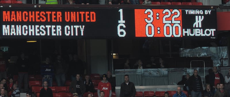 The scoreboard shows the final score in the English Premier League football match between Manchester United and Manchester City at Old Trafford in Manchester, north-west England on October 23, 2011. Manchester United lost 1-6 to Manchester City. AFP PHOTO/ANDREW YATES

RESTRICTED TO EDITORIAL USE. No use with unauthorized audio, video, data, fixture lists, club/league logos or “live” services. Online in-match use limited to 45 images, no video emulation. No use in betting, games or single club/league/player publications