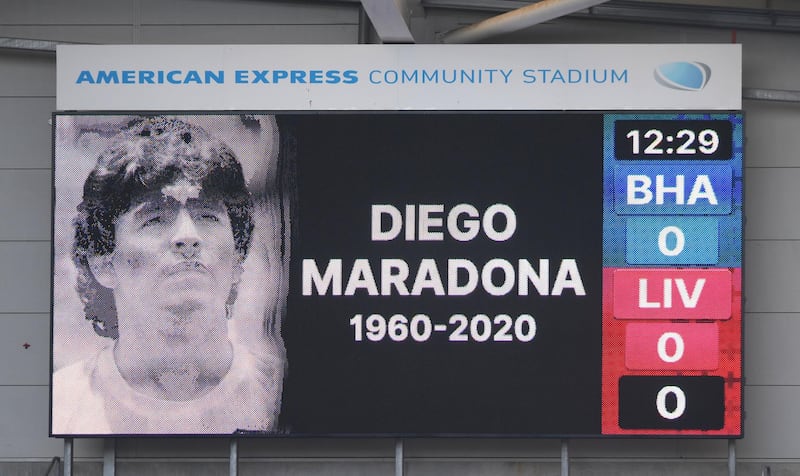 A tribute on the big screen at the Amex Stadium to the late Argentina legend Diego Maradona. PA