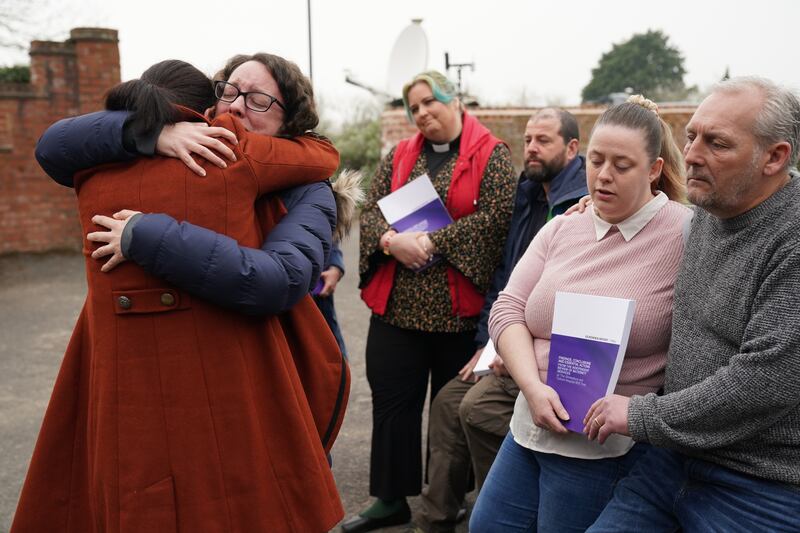 Rhiannon Davies, left, embraces Kayleigh Griffiths, following the release on Wednesday of the final report by Donna Ockenden, chairwoman of the Independent Review into Maternity Services at the Shrewsbury and Telford Hospital NHS Trust, in Shropshire. The inquiry found that hundreds of newborn deaths at Shrewsbury hospital were avoidable. PA
