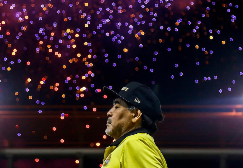 In this file picture taken on November 29, 2018 Mexican second division football club Dorados' Argentine coach Diego Armando Maradona looks on before a match of the first round of the Final against Atletico San Luis at the Banorte stadium in Culiacan, Sinaloa State, Mexico. AFP