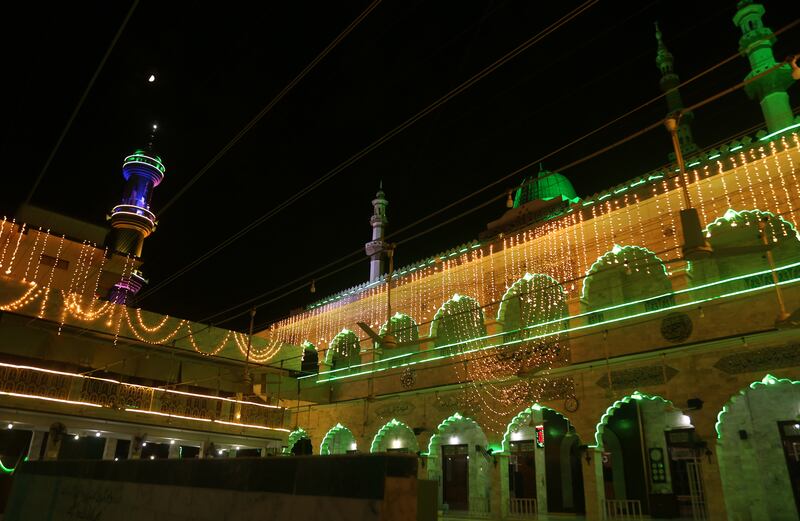 An illuminated mosque in Karachi. EPA
