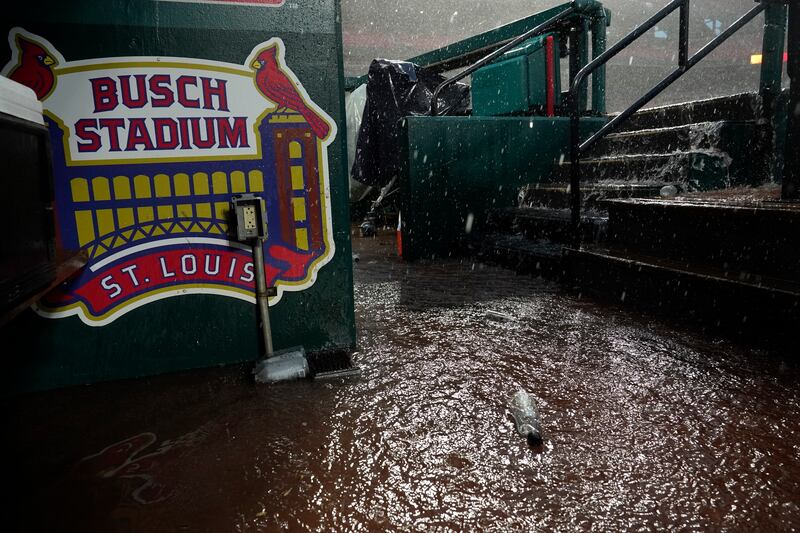 A flooded St Louis Cardinals' dugout after a baseball game against the New York Yankees in 2023 was washed out. AP