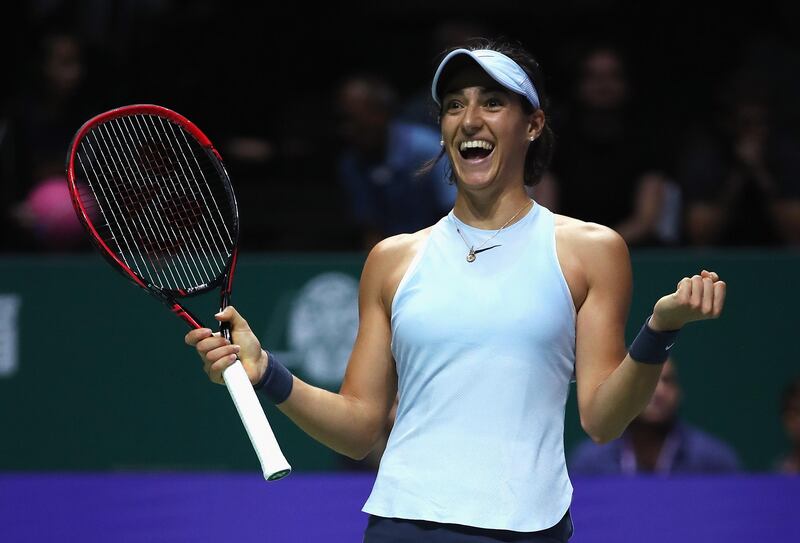 SINGAPORE - OCTOBER 27:  Caroline Garcia of France celebrates victory in her singles match against Caroline Wozniacki of Denmark during day 6 of the BNP Paribas WTA Finals Singapore presented by SC Global at Singapore Sports Hub on October 27, 2017 in Singapore.  (Photo by Matthew Stockman/Getty Images)